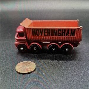Vintage Red Toy Truck with Black Wheels
